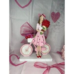 VALENTINES DAY GIRL WITH BIKE AND ROSE BOQUET